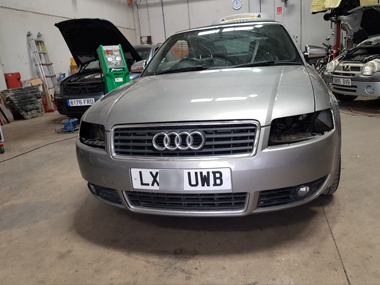 Audi A4 with lights removed to re-align Audi A4 convertible
